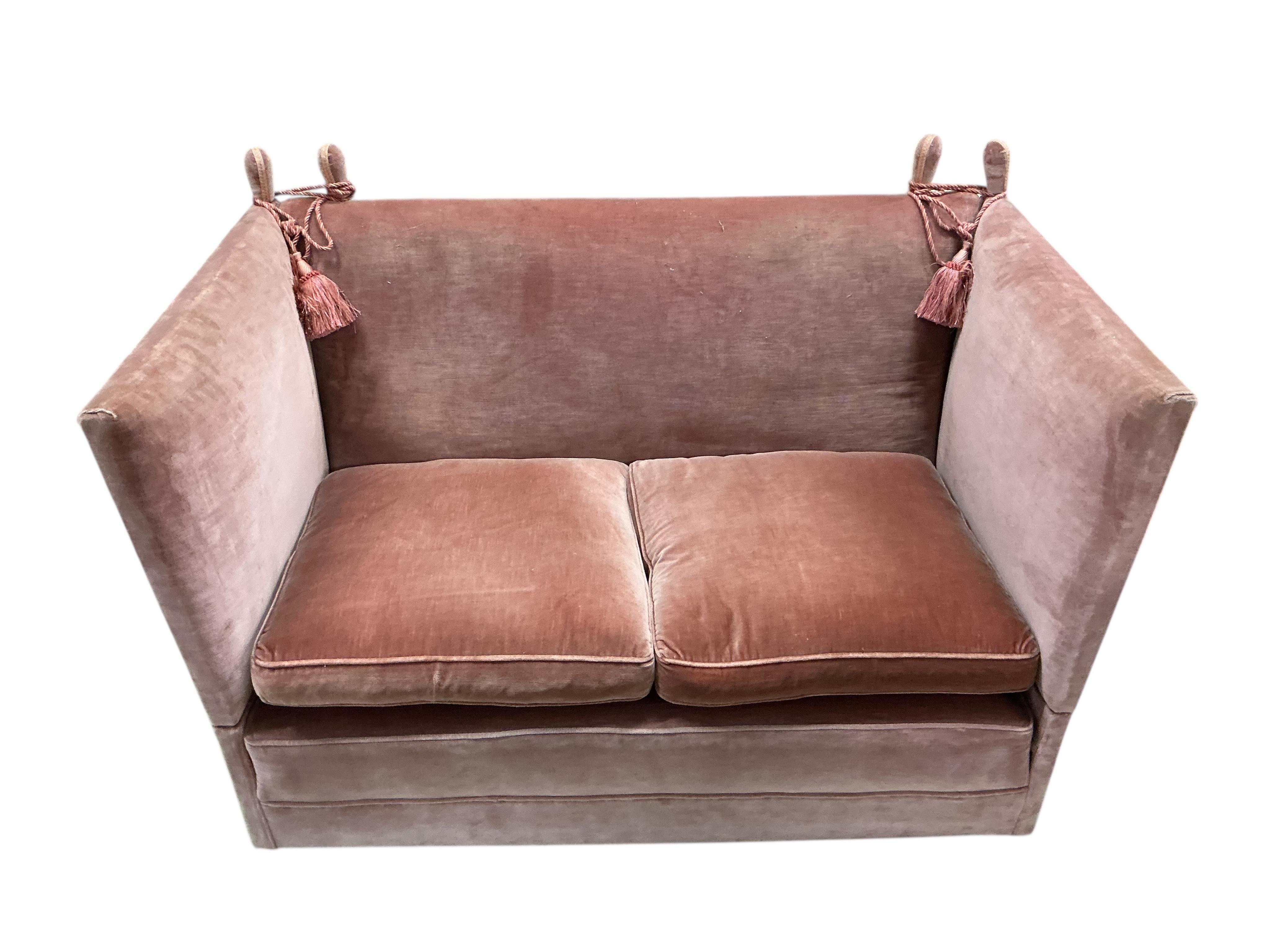 An upholstered two seater Knole settee, width 148cm, depth 84cm, height 101cm